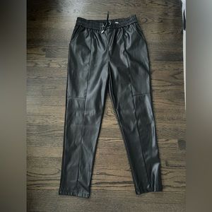 Black faux leather pants. Size Large, brand new, never worn.